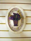 Quadro oval vaso com flor